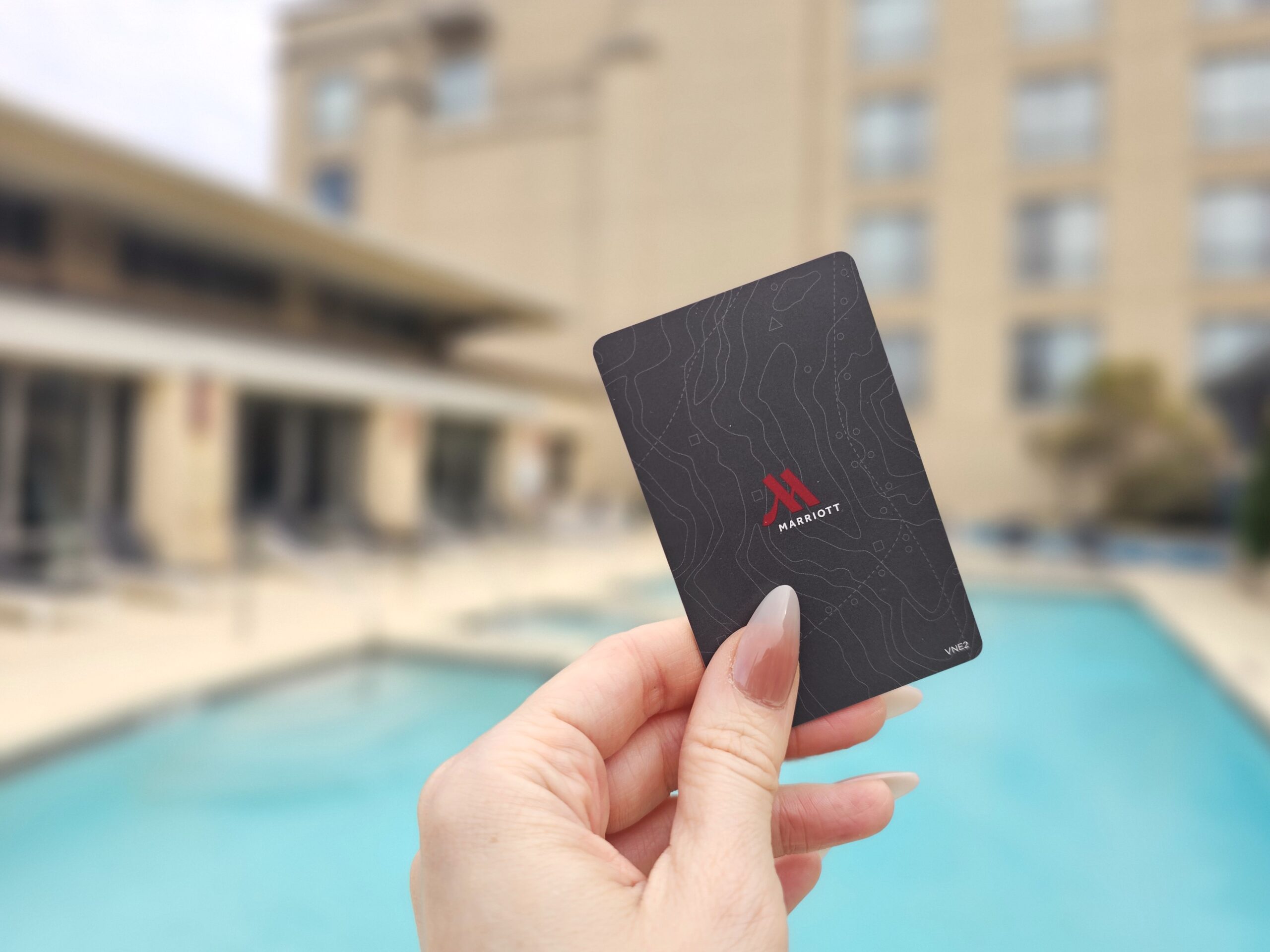 Marriott at Legacy Town Center hotel key card with pool in the background. PC: Michelle Joy, Harbors & Havens blog