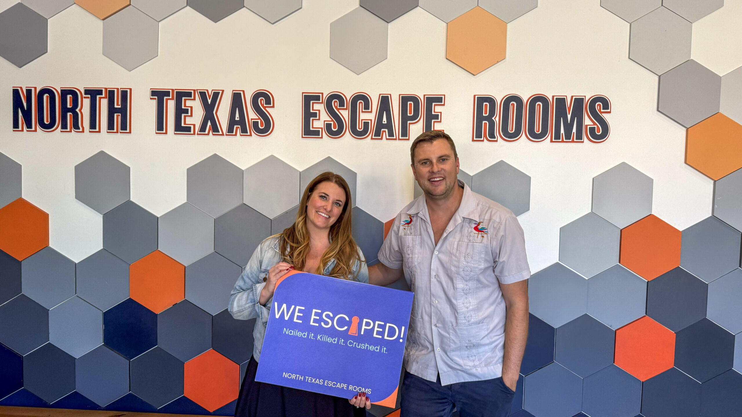 Fun things to do in Plano for Couples - Couple in the Kitchen at North Texas Escape Rooms in Plano