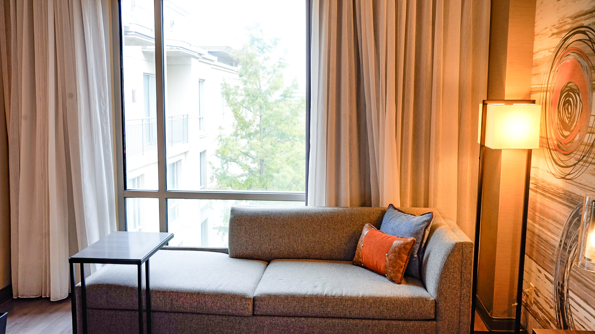 Couple in the Kitchen at the Marriott at Legacy Town Center hotel - lounge seating in room